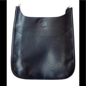 Ahdorned black faux leather messenger bag with 3 interchangeable straps.